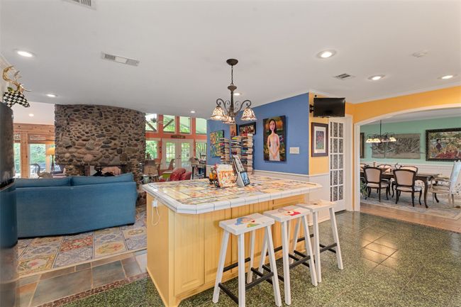 Kitchen Island by Circle Fireplace and Curved Denim Sofa | Image 11