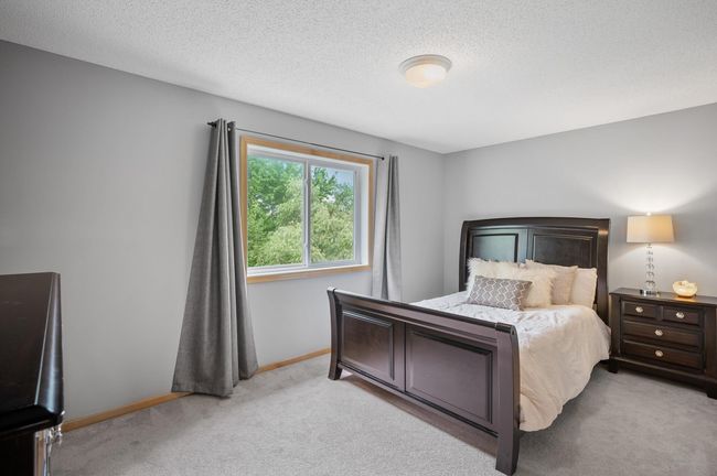 3rd bedroom on the upper level overlooks the back yard. | Image 25