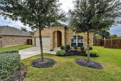 Mature landscape at this cul-de-sac greenbelt home site. | Image 3