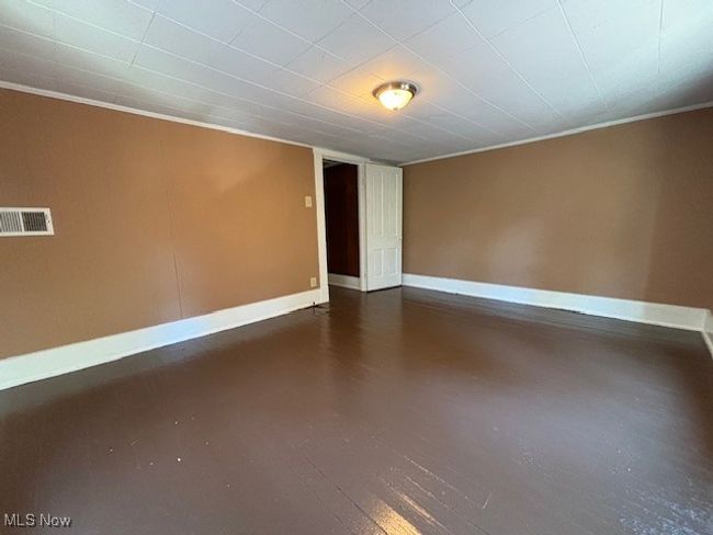 Unfurnished room featuring ornamental molding | Image 16