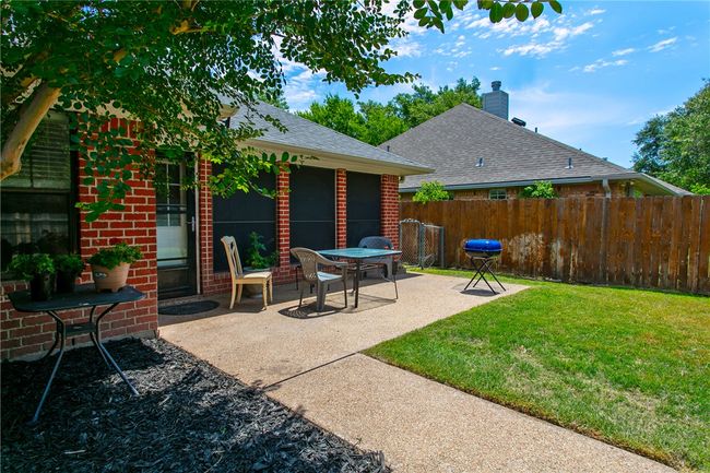 View of patio featuring grilling area | Image 25