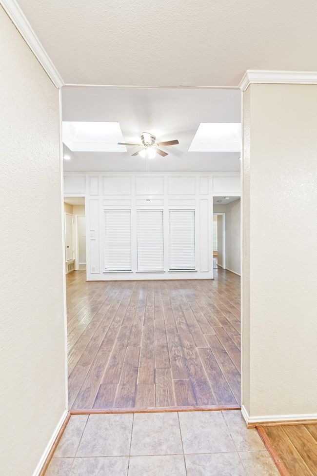 Corridor with light wood-style floors | Image 6