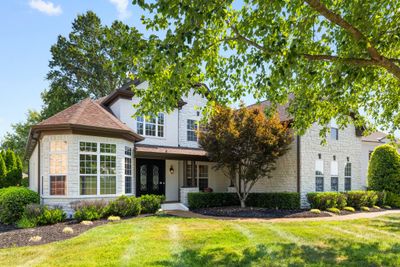 The home features iron doors at the front entry as well as extensive "uplighting" at night. | Image 2