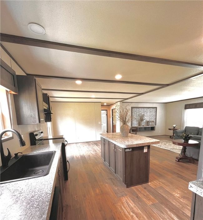 Kitchen from laundry room view. | Image 4