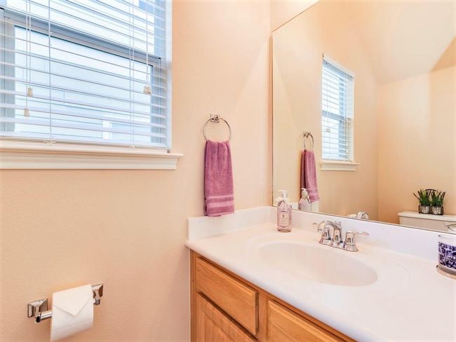 There is also a convenient main floor guest powder room. | Image 23