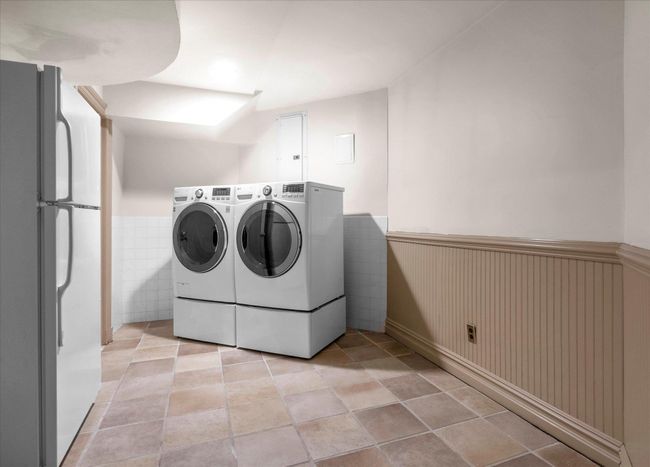 Laundry room featuring separate washer and dryer | Image 23