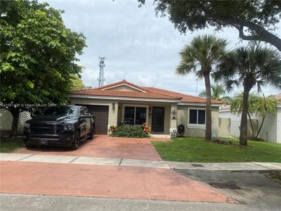 9041 Nw 193rd Ter, House other with 3 bedrooms, 2 bathrooms and null parking in Hialeah FL | Image 1