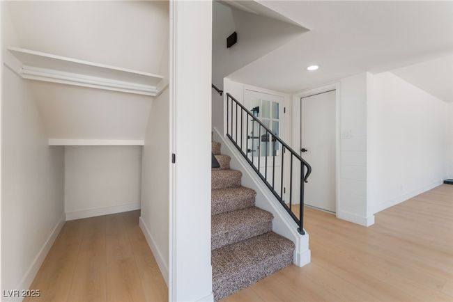 Stairway featuring wood finished floors and recessed lighting | Image 22
