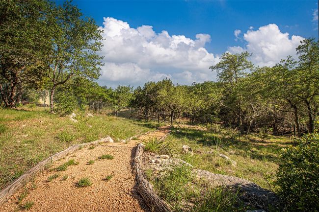 View of yard featuring fence | Image 34