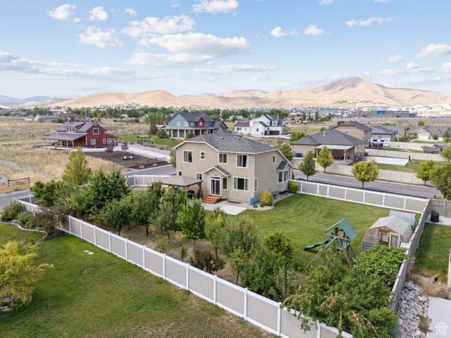 Aerial view of residential area with mountains | Image 58