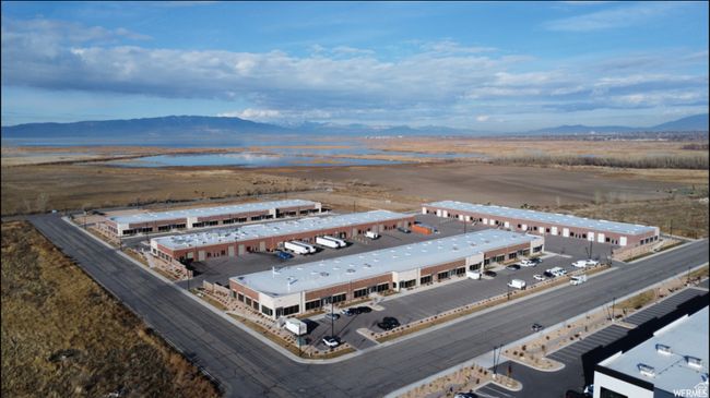 Drone / aerial view featuring a water and mountain view | Image 14