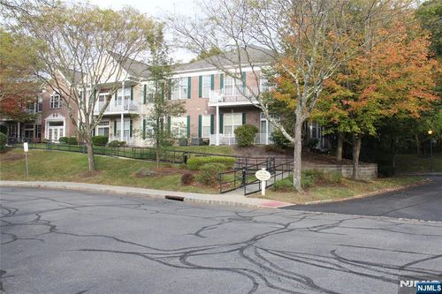 705 Four Seasons Dr, Wayne, NJ, 07470-1947 | Card Image