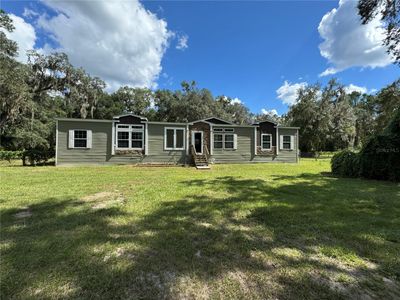 3951 Ne 175 Th Street, House other with 4 bedrooms, 2 bathrooms and null parking in Citra FL | Image 1