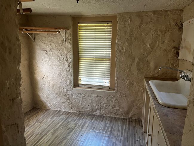 Upstairs Kitchenette area with closet & storage space | Image 12