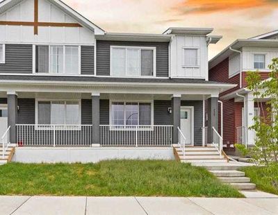 225 Creekside Dr Sw, Home with 4 bedrooms, 3 bathrooms and 2 parking in Calgary AB | Image 1