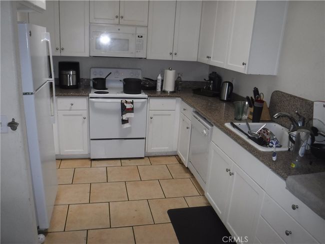 Kitchen with Granite Counters & Tile floors | Image 8