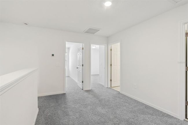 16419 Bird Of Paradise Ave, Townhouse with 3 bedrooms, 3 bathrooms and null parking in CLERMONT FL | Image 19
