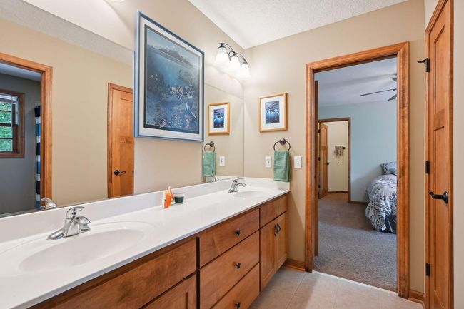 Jack & Jill bathroom between upper level bedrooms. | Image 19