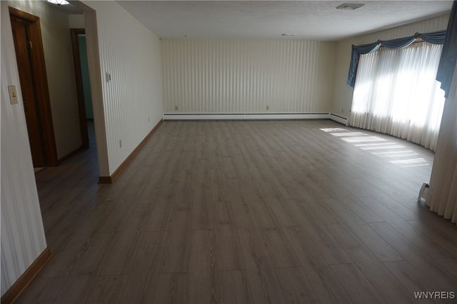 Very spacious 21' x 17' living room combined with a 12' X 8' dining room. | Image 8