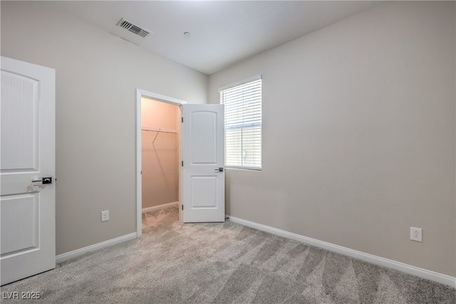 Downstairs bedroom with enormous walk in closet | Image 17