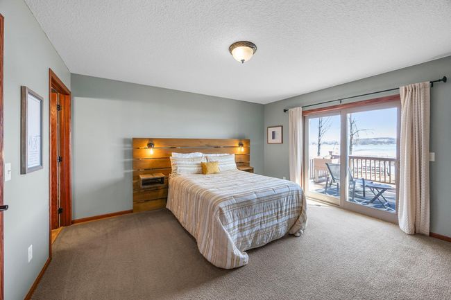 Primary bedroom offers a balcony! | Image 24