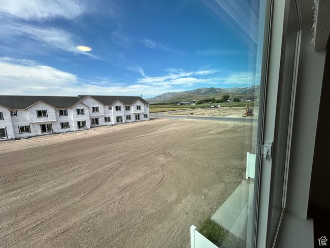 View of building exterior featuring a mountain view | Image 8