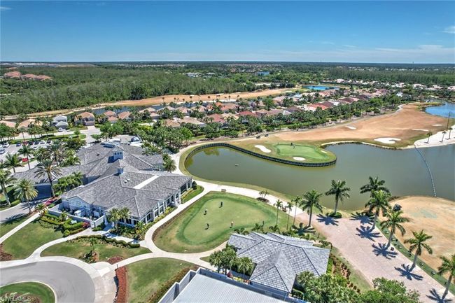 Birds eye view of property with a water view and view of golf course | Image 45