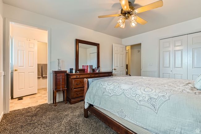 Bedroom featuring a closet and a ceiling fan | Image 11