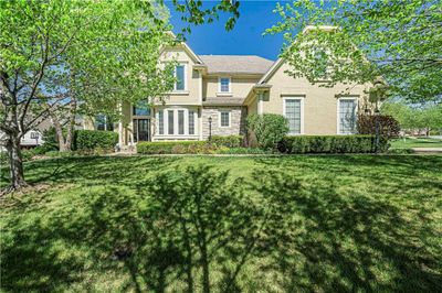 View of front of property featuring a front yard | Image 1