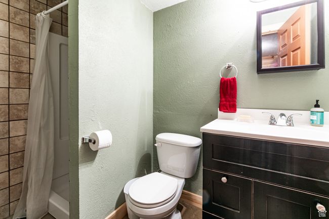 Full bath with vanity and tiled shower | Image 23