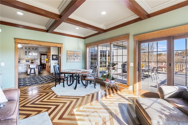 Dining room featuring crown molding, recessed lighting, coffered ceiling, and beamed ceiling | Image 16