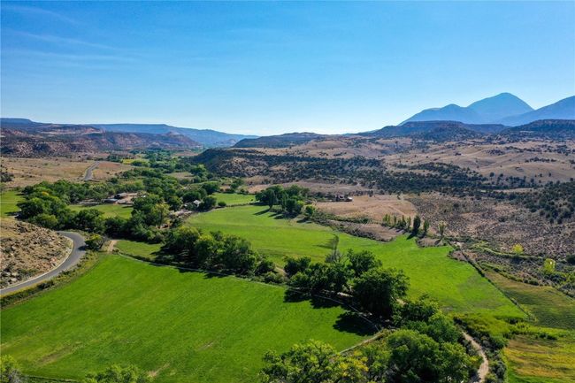 Aerial view featuring a mountain view | Image 36