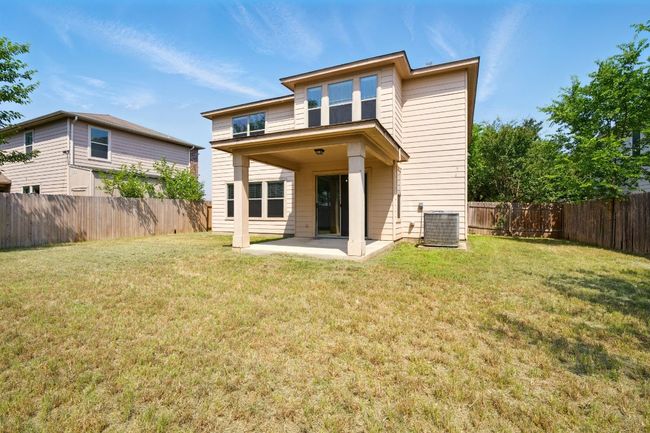 Rear view of property with central AC unit and a patio area | Image 20