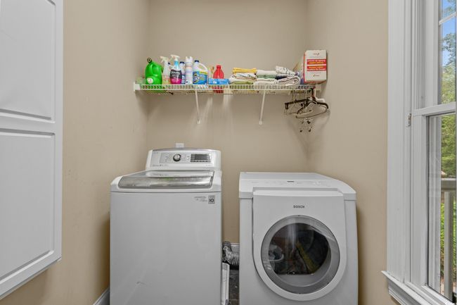 Washroom with washing machine and dryer | Image 36