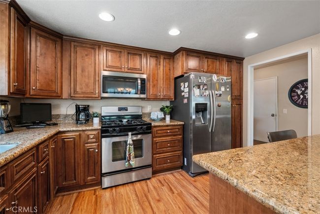 Here is a look into the kitchen from the dining room | Image 18