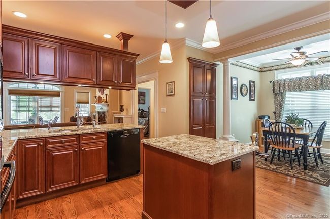 There is plenty of cabinetry, especially with the additional built-in pantry near the breakfast nook. | Image 8