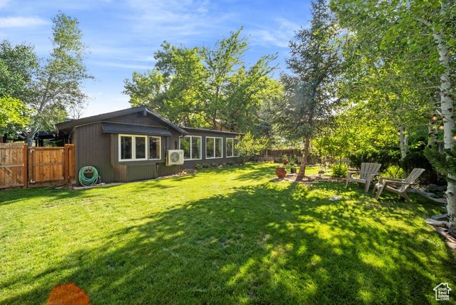 View of yard with a cooling unit | Image 29