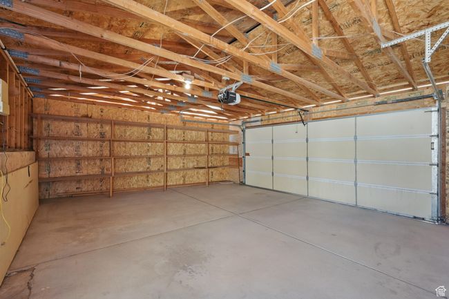 Garage with a garage door opener | Image 39