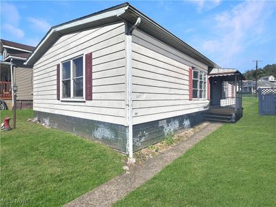 View of home's exterior featuring a yard | Image 3