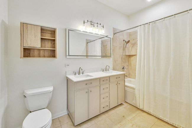 Primary bathroom with new vanity, mirror and light | Image 18