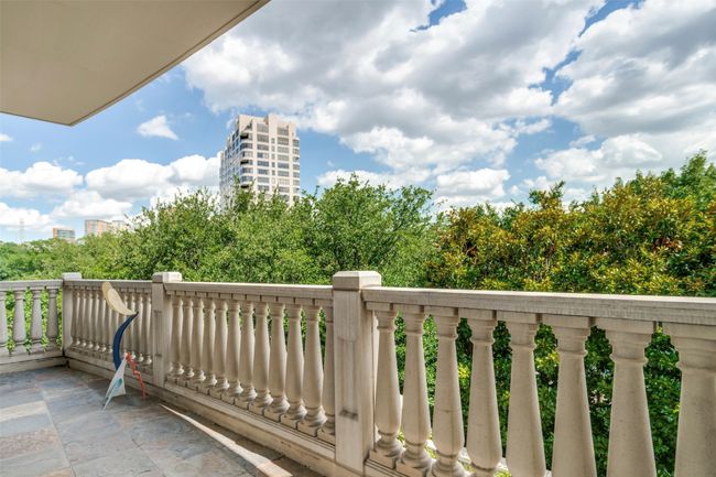One of six balconies with tree-top views. | Image 18