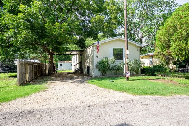 Manufactured / mobile home featuring driveway | Image 5