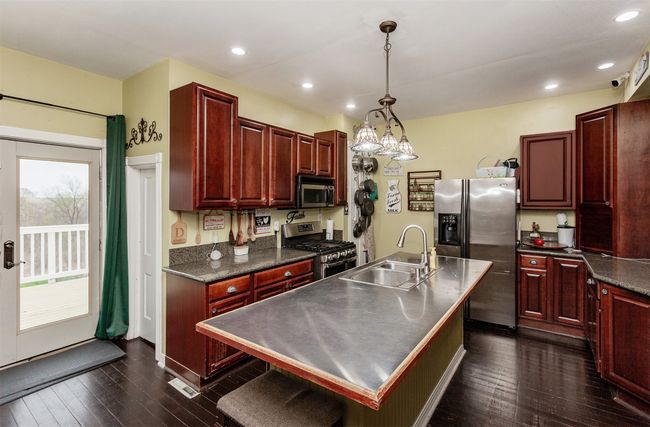 5825 G24 Hwy, Home with 7 bedrooms, 4 bathrooms and null parking in Carlisle IA | Image 6