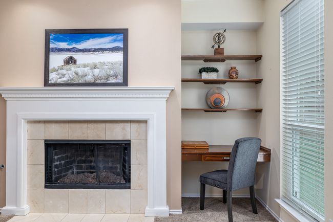 Living room featuring light colored carpet and a ceiling fan | Image 14