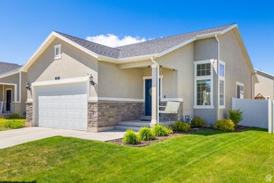 Lovely Overland bungalow with porch swing (Egan plan). Welcome home! | Image 1