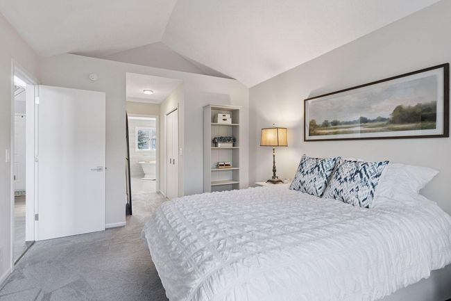 Main level primary suite with new carpet and fresh paint | Image 9