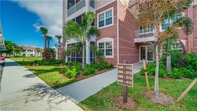 View of community with a lawn | Image 10