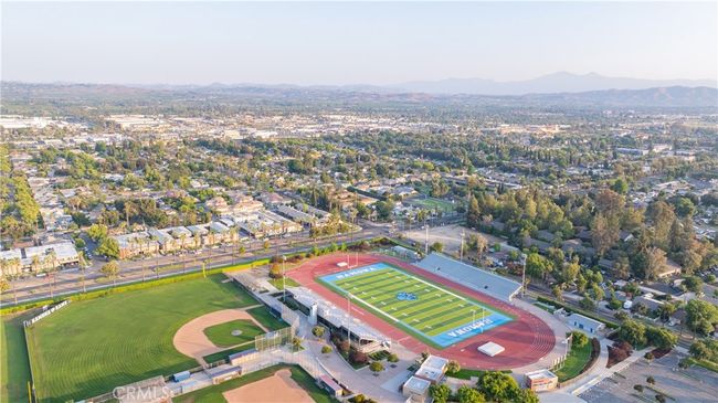 Bird’s-eye views show lot depth, neighborhood proximity, and scale of both main and guest structures. | Image 54