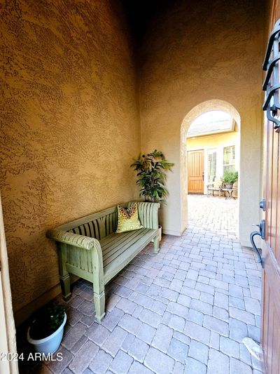 Beautiful entry into the large and bright courtyard. | Image 2