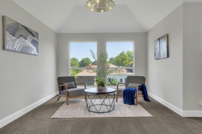 Living area featuring lofted ceiling and carpet flooring | Image 28